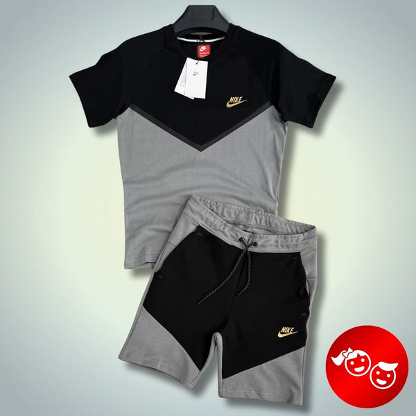 Nike Tech Fleece gyerekszett rövidnadrággal, fekete-szürke, arany logóval. Prémium minőségű